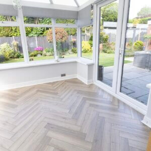 12mm Greige Oak Herringbone Laminate