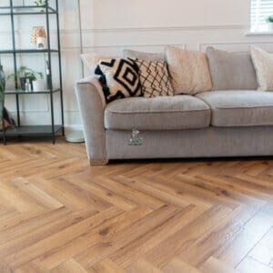 12mm Lignum Oak Robust Fumed Herringbone Laminate Livingroom