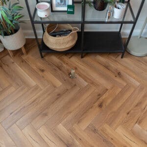 Lignum Oak Robust Fumed Herringbone Laminate Livingroom