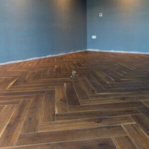 Fusion 12mm Coffee Oak Herringbone Laminate Flooring