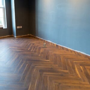 Lignum 12mm Fusion Coffee Oak Herringbone Laminate Flooring