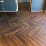 12mm Fusion Coffee Oak Herringbone Laminate Flooring