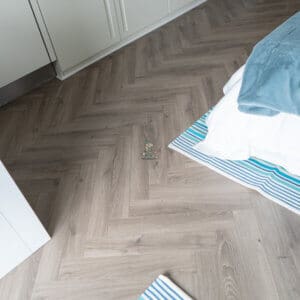 12mm Fusion Riverbed Oak Herringbone Laminate Flooring