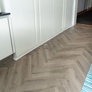 Riverbed Oak 12mm Herringbone Laminate Flooring