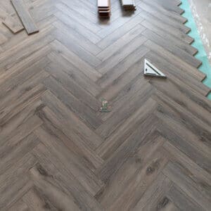 Lignum Fusion Volcanic Oak Herringbone Laminate Flooring