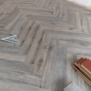 Fusion 12mm Volcanic Oak Herringbone Laminate Flooring