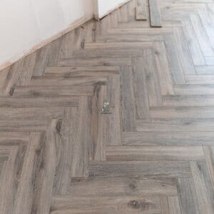 12mm Lignum Fusion Volcanic Oak Herringbone Laminate Flooring