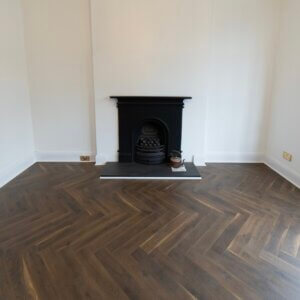 Fusion Coffee Oak Herringbone Laminate Flooring 12mm