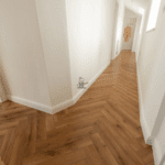 Fusion 12mm Oak Robust Fumed Herringbone Laminate Flooring Hallway