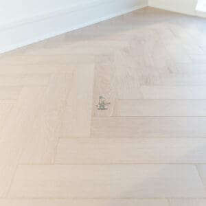 Craft 12mm Linen Oak Herringbone AC5 Laminate Flooring