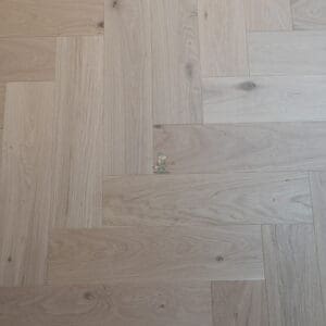 Riviera Prime Click 14/3 x 150mm Pale Invisible Oak Herringbone Engineered Wood Flooring