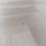 Imperial Grey Luxury Vinyl Click Flooring with a sleek grey wood-grain finish.