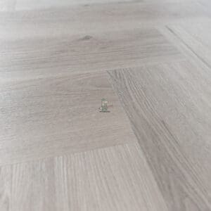 Imperial Grey Luxury Vinyl Click Flooring with a sleek grey wood-grain finish.