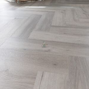 Imperial Grey Luxury Vinyl Click Flooring with a sleek grey wood-grain finish.