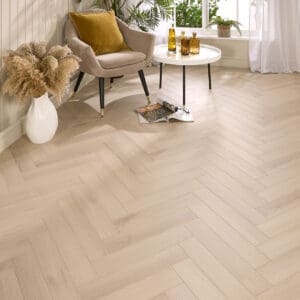 Coral Oak AC5 Laminate Flooring with soft, sun-bleached tones and a realistic wood texture.