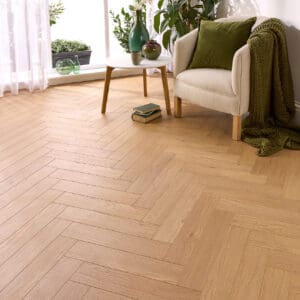 Warm golden Sunset Oak AC5 laminate flooring with realistic wood texture.