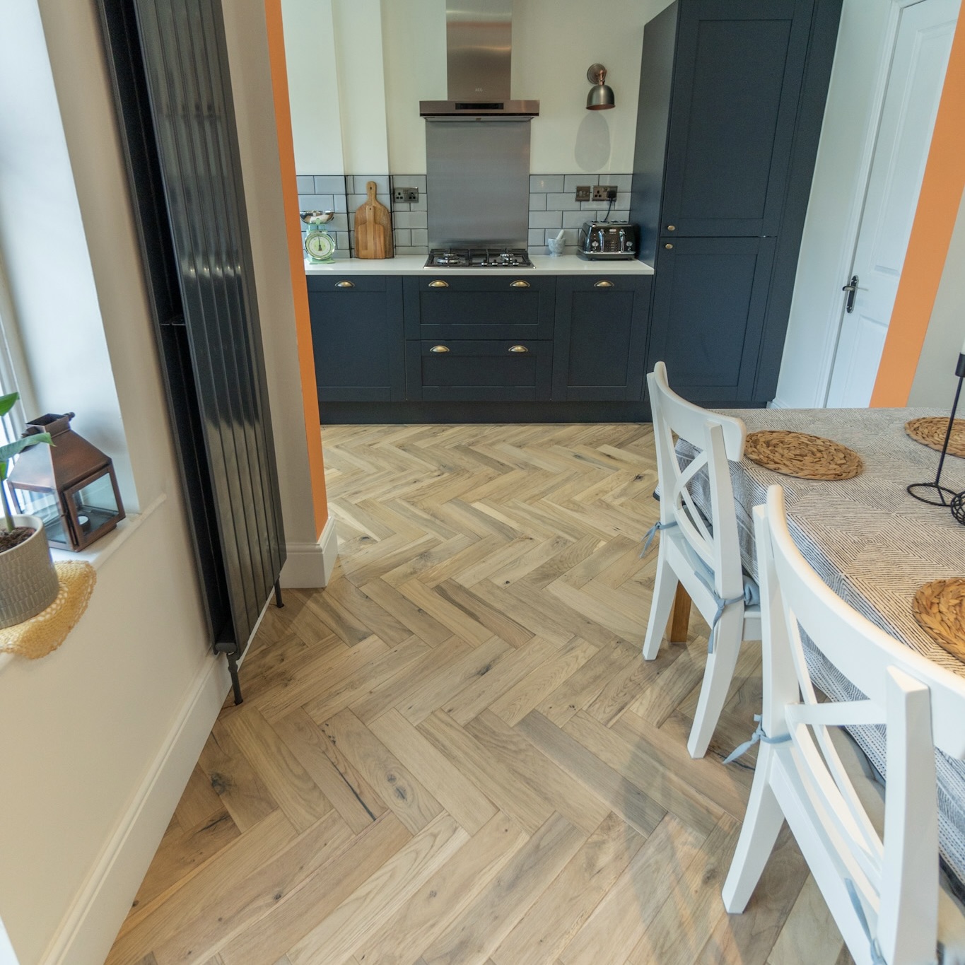 Cambridge 20/5 x 70mm Worn Cathedral Oak Herringbone Engineered Wood Flooring with light oak tones and a classic herringbone finish